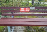 Sitzbank mit Notfallschild